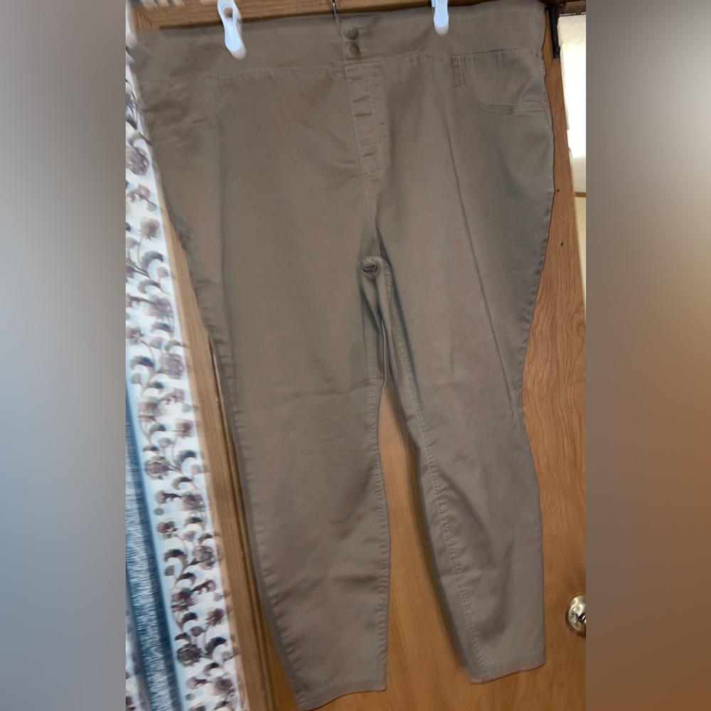 Darker khaki pants. Regular length. Worn a few times and not stained.